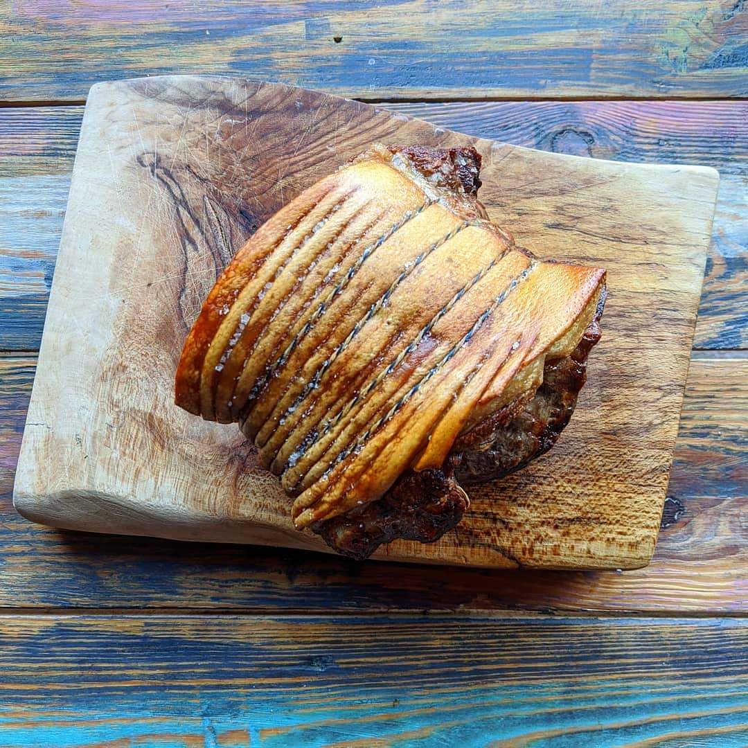 Rolled Shoulder of Pork stuffed with Sage & Onion Stuffing